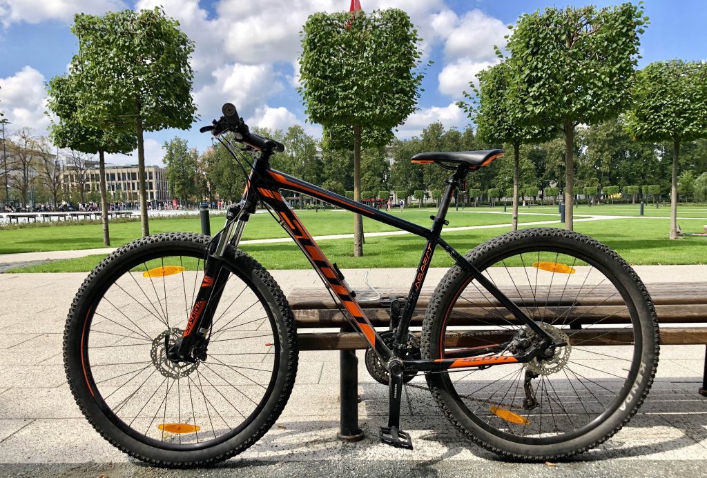 MTB Mountain Bike Scott in the background of the park in Vilnius for rent