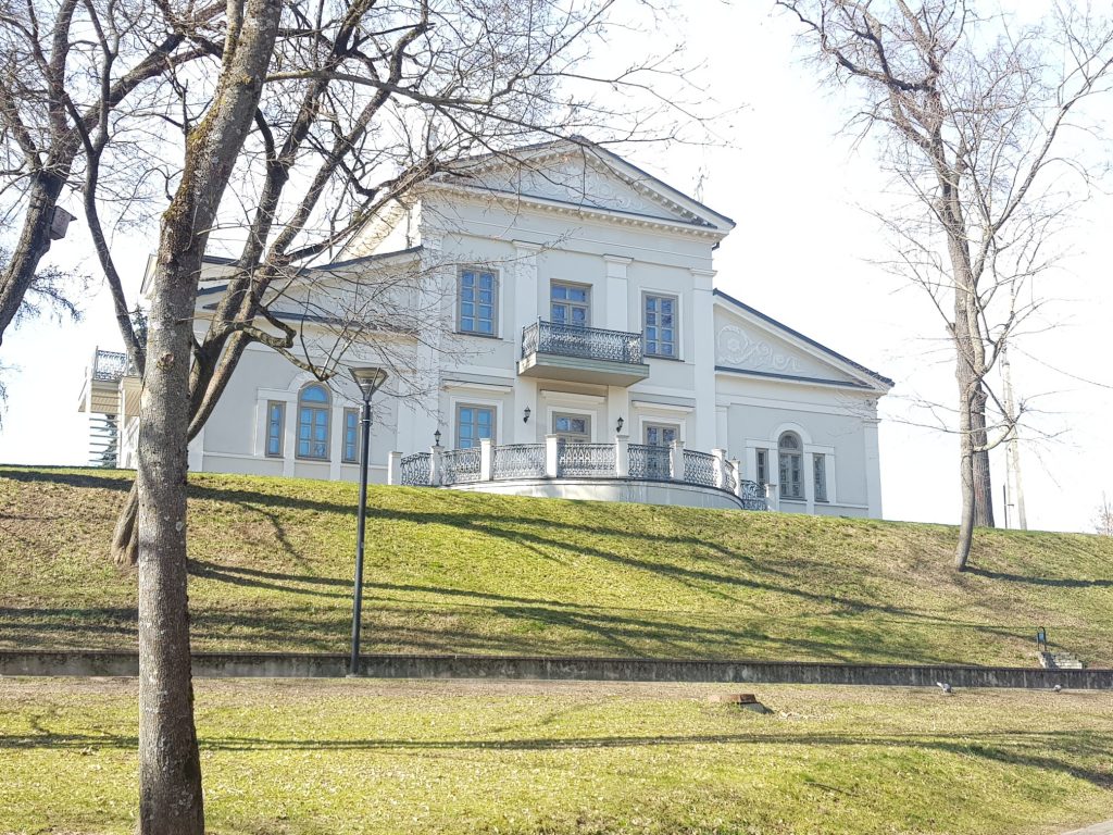 white historical building on the hill